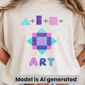 May include: A cream-colored t-shirt featuring a graphic print of a geometric equation with a teal triangle, a purple polka-dot rectangle, and a pink textured square, forming a star-like quilt pattern below, with the word ART in colorful letters.