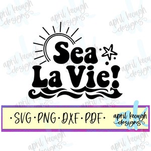 May include: Black and white graphic design with a sun, waves, and the text "Sea La Vie!" in a retro font.