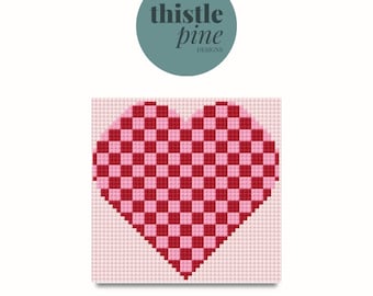 May include: A pink and red checkered heart design on a white background. The design is pixelated, resembling a pixel art image.