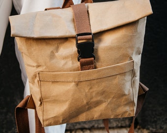 Beige vegan leather backpack with front pocket