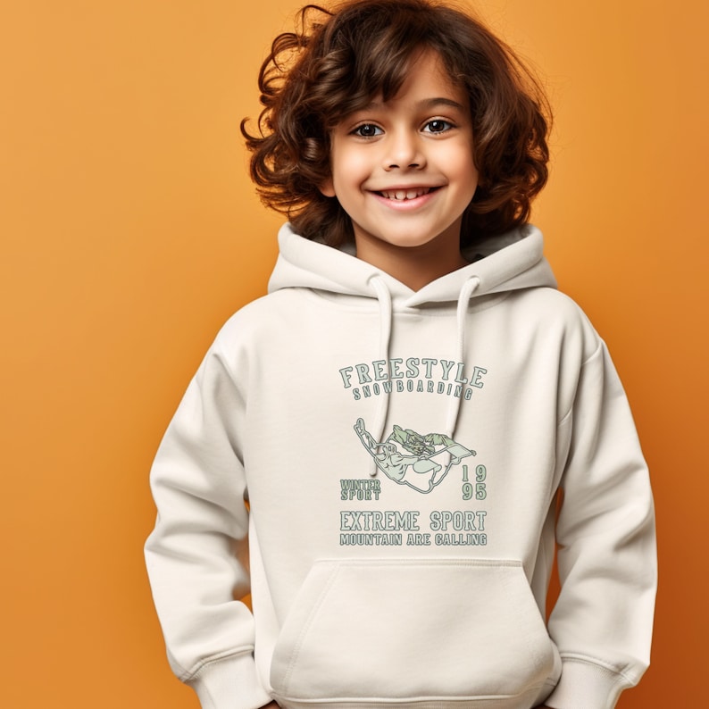 May include: White hoodie with a graphic of a snowboarder and the text "FREESTYLE SNOWBOARDING WINTER SPORT EXTREME SPORT MOUNTAIN ARE CALLING 1995".