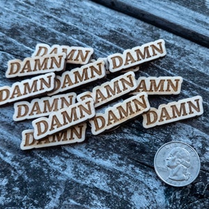To &quot;Give a Damn&quot; is to care. Damnit, show some love! Bag of 12 &quot;Damn&#39;s&quot;