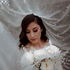 Selling a beautiful Off white wedding veil with beautiful embellishments!!!! David main image 4