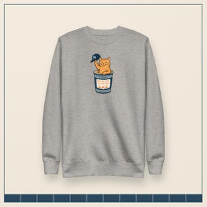 NYC Baseball Cap Cat Sweatshirt | Orange Tabby Bodega Cat Crewneck | NY Gift