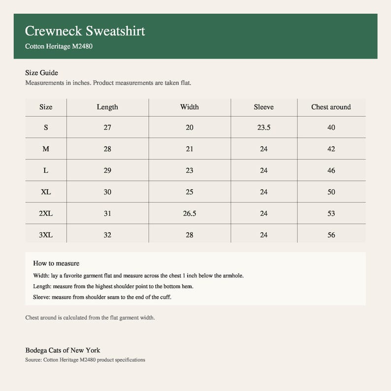 May include: A size guide chart for a Cotton Heritage M2480 crewneck sweatshirt. The table lists sizes from S to 3XL with corresponding length, width, sleeve, and chest measurements in inches. Includes instructions on how to measure the garment flat.