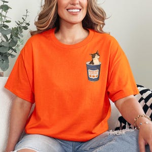 Bodega Cat T-Shirt | Tabby Cat Coffee Cup Pocket Tee | Brooklyn NY Gift
