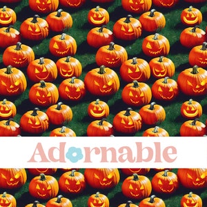 May include: A seamless pattern of orange jack-o'-lantern pumpkins with carved faces on a green background. The pumpkins are arranged in a repeating pattern, creating a festive and spooky Halloween design.