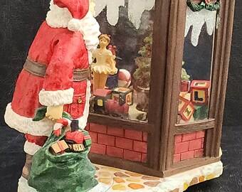 Santa Looking Through Toy Shop Window Musical/Music Box Plays Jingle Bells