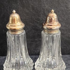 Pair of 1930s Silver Plate and Press Glass Sugar Shakers 6 Inches Tall