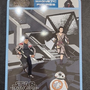 May include: A Star Wars The Force Awakens magnetic figure set featuring Rey, Finn, and BB-8. The set is packaged in a blue and white tin with a Star Wars logo and the words "Magnetic Figures".
