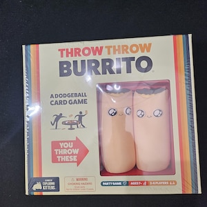 May include: A box for the Throw Throw Burrito card game, a dodgeball card game by Exploding Kittens. The box shows two cartoon burritos with faces, and the text "You Throw These".