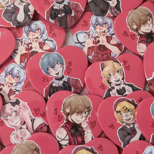 May include: A collection of heart-shaped buttons with anime-style character illustrations. The buttons are primarily pink with various characters in red and black outfits. Some characters are making heart shapes with their hands.