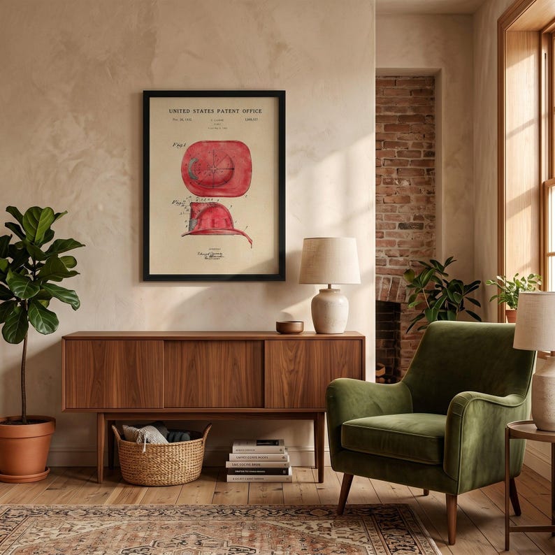 The image is a framed patent drawing of a red fire helmet, depicting the design and features of the helmet.