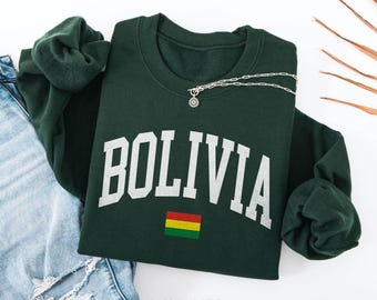 Moletom com gola redonda com a bandeira da Bolívia, presente perfeito para viajantes pela América do Sul.
