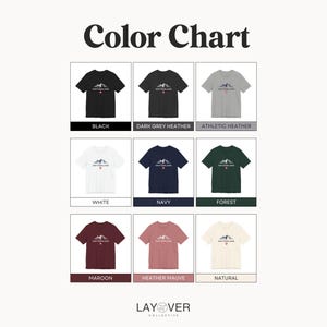 K&ouml;nnte beinhalten: Farbkarte mit T-Shirts in verschiedenen Farben: Schwarz, Dunkelgrau-Melange, Athletic Heather, Wei&szlig;, Marine, Waldgr&uuml;n, Bordeauxrot, Heather Mauve und Natur. Jedes Shirt hat eine Berg-Grafik und das Wort "Switzerland".