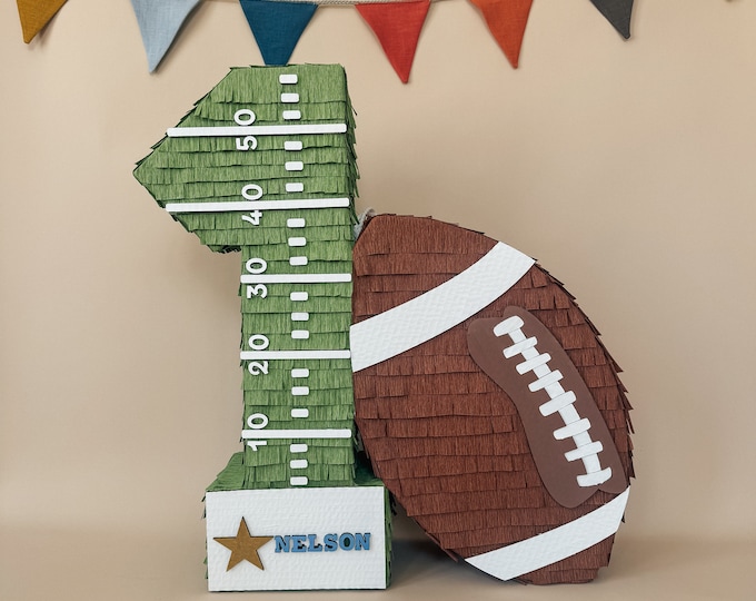 Football piñata- first year down birthday party
