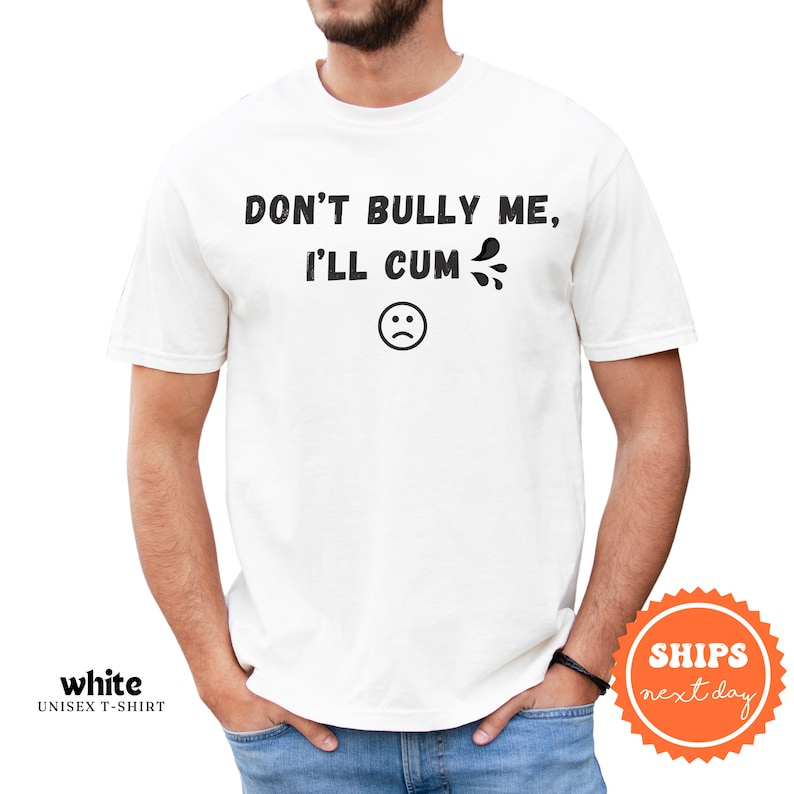 a man wearing a white t - shirt with the words don't bullying me