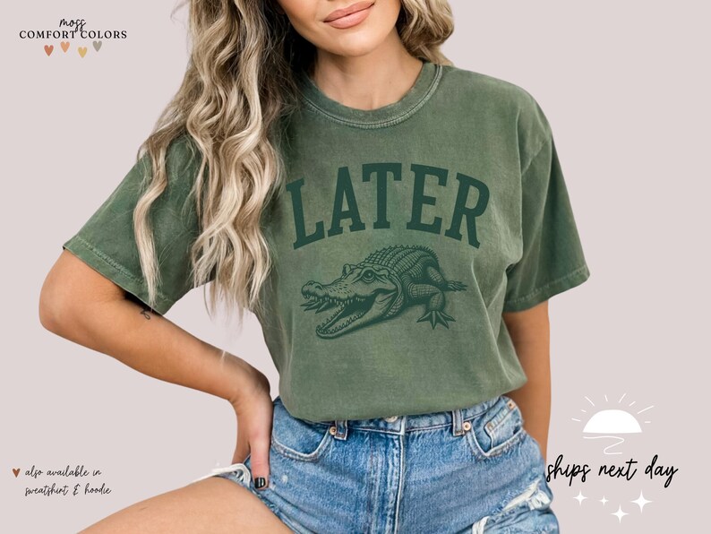 a woman wearing a t - shirt that says later