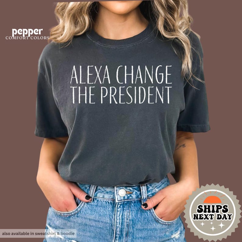 a woman wearing a t - shirt that says, alexandria change the president