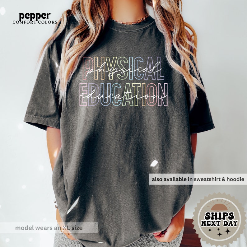 a woman wearing a black shirt that says physical education