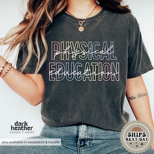 a woman wearing a black shirt that says physical education