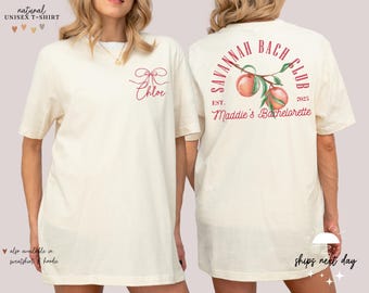 May include: Two white t-shirts with different designs. The first shirt has a red bow with the name "Chloe" printed on it. The second shirt has a peach design with the text "Savannah Bach Club Est. 2025 Maddie's Bachelorette".