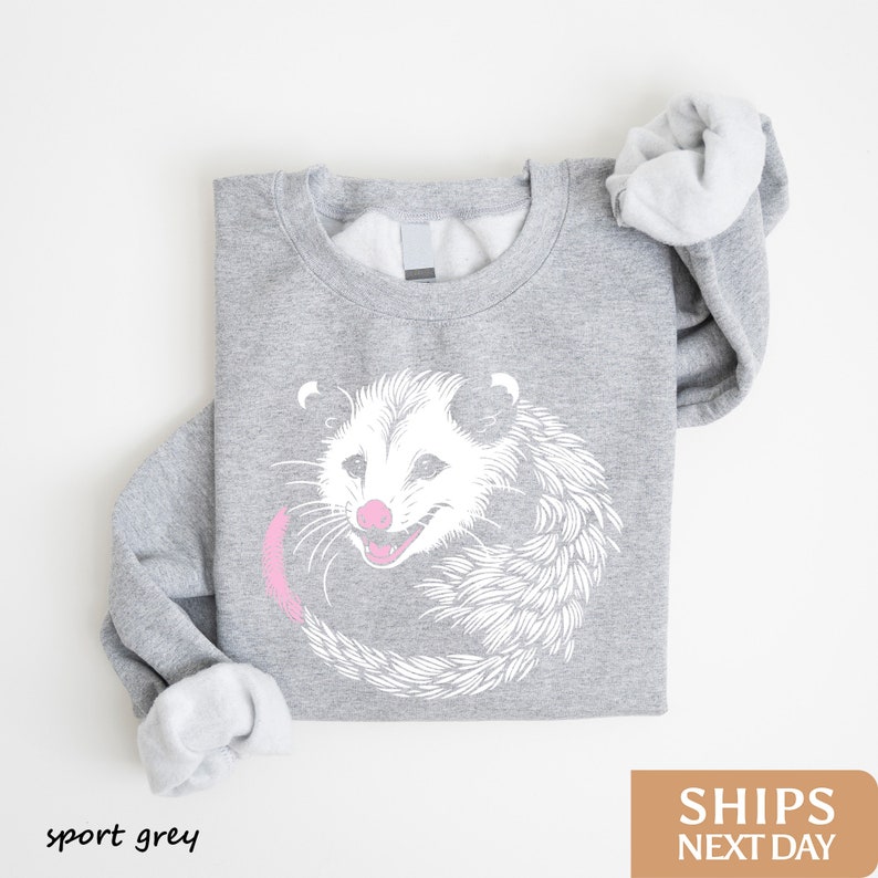 a sweater with a picture of a hedge on it