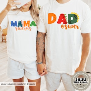 a man and a woman wearing matching shirts