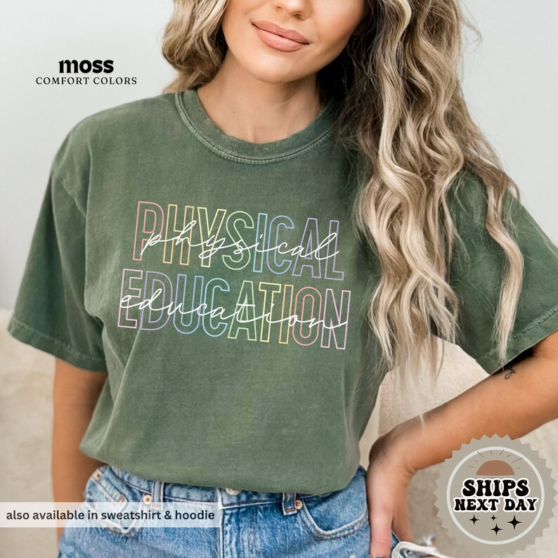 a woman wearing a green shirt that says physical education