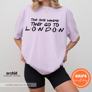 a woman wearing a t - shirt that says the one where they go to london