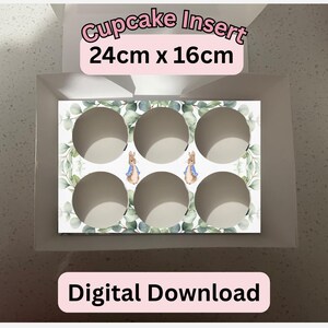 May include: A white cupcake insert with six circular cavities, measuring 24cm x 16cm. The insert features a decorative design with green foliage and two illustrations of a rabbit. The text "Cupcake Insert" and "Digital Download" are also visible.