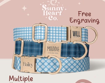 May include: Three personalized dog collars with gold-colored hardware. The collars feature blue and white gingham and plaid patterns. Each collar has a name engraved on the buckle: "Bailey", "Maddie", and "Will". The image includes the text "Free Engraving" and "Multiple Designs".