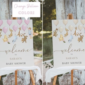 Peut inclure: Panneau d'accueil pour la baby shower de Sarah avec Winnie l'ourson et ses amis tenant des ballons roses. Le panneau est sur un chevalet et a un fond brun clair.