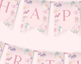 May include: Pink and blue banner with the words "Happy Birthday" in white letters. The banner is decorated with sea creatures like seahorses, whales, and octopuses.