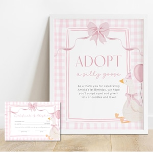 May include: A framed pink and white gingham print with the words "ADOPT a silly goose". A matching certificate of adoption is on the left. The print features a cartoon goose with a party hat and a pink bow.