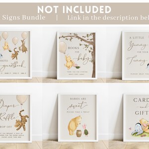 May include: Ten Winnie the Pooh themed baby shower signs with illustrations of Winnie the Pooh, Piglet, Tigger, and Eeyore. The signs include titles such as "Photo Guestbook", "Books for Baby", "A Little Yummy for Your Tummy", "Diaper Raffle", "Babies are Sweet", and "Cards and Gifts".
