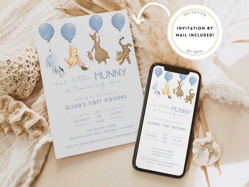 May include: A Winnie the Pooh themed first birthday invitation with blue balloons and a cute illustration of Winnie the Pooh and his friends. The invitation includes the text "our little HUNNY is turning one" and details for the party, including the date, time, and location. The invitation also includes a note that a physical invitation will be mailed.