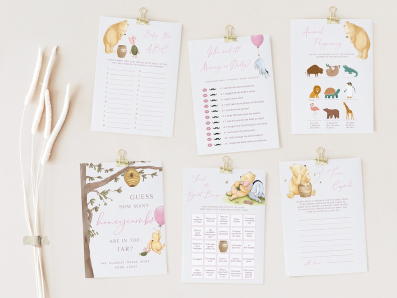 May include: A set of Winnie the Pooh themed baby shower games. The games include "Baby Shower ABC", "Who will be Mommy or Daddy?", "Animal Guessing", "Guess How Many Honeycombs are in the Jar?", and "Sweetest Baby Bingo".