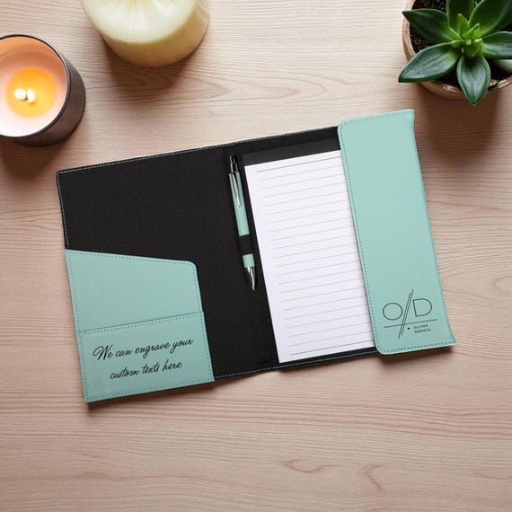 Refillable monogrammed leather planner cover — practical meets luxe, and you never have to buy a new one when the pages run out.