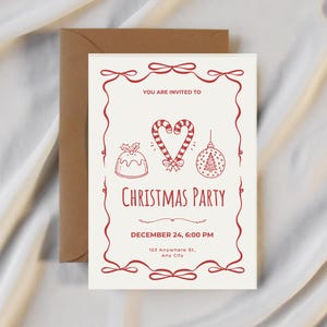 May include: A cream-colored Christmas party invitation with red decorative borders and illustrations of a pudding, candy canes, and a Christmas tree ornament. The invitation includes the text "CHRISTMAS PARTY" and event details.