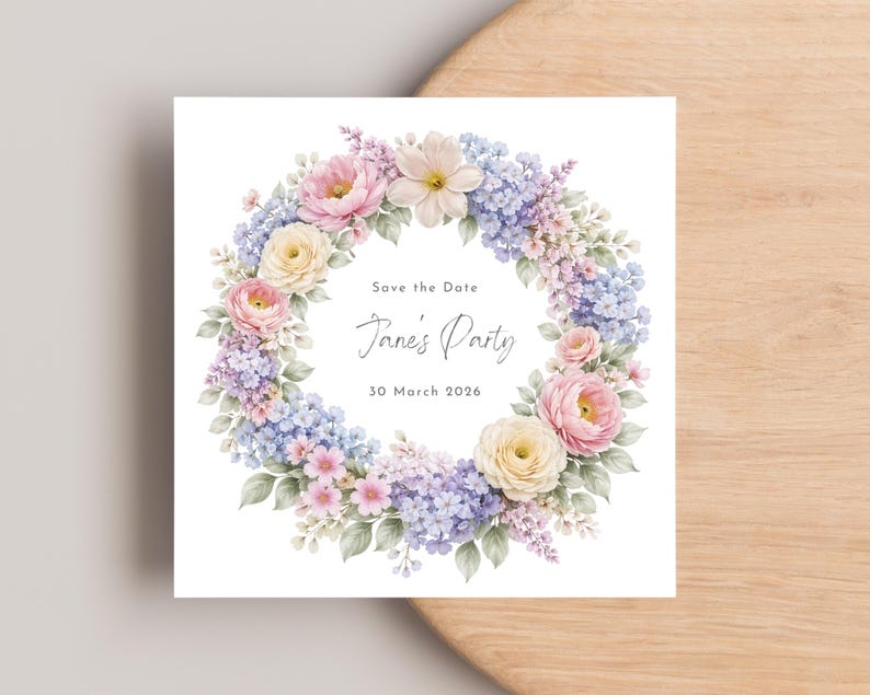 May include: Square invitation card featuring a watercolor floral wreath in pastel colors. The wreath includes pink roses, yellow flowers, and blue and purple hydrangeas. Text inside the wreath reads "Save the Date" and "Jane's Party, 30 March 2026".