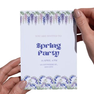 May include: A light purple invitation card with floral illustrations and the text "Spring Party". The card is held by two hands. The invitation includes the date, time, and location of the event.