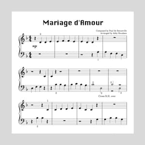 Puede incluir: Partitura musical para la canción "Mariage d'Amour" de Paul de Senneville, arreglada por Abby Knudsen. La música está escrita en notación estándar con una clave de sol y una clave de fa. El título de la canción está escrito en letras grandes y en negrita en la parte superior de la página. Los nombres del compositor y el arreglista se enumeran debajo del título.