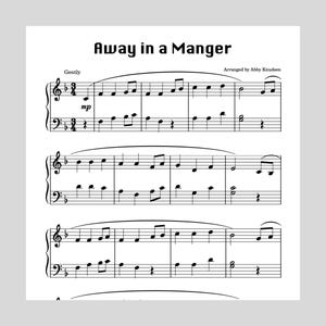 May include: A sheet music score for the Christmas carol "Away in a Manger" arranged by Abby Knudson. The music is written in the key of C major and is in 4/4 time. The lyrics are printed below the music.