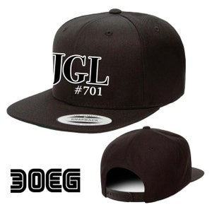 JGL on a snapback hat.