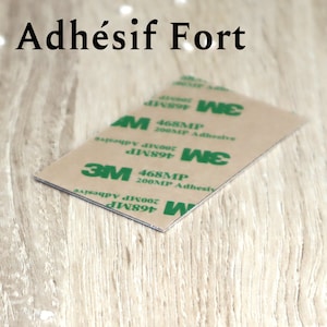 Adhésif fort au verso type 3M