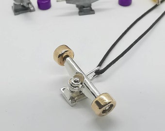 SKATEBOARD - small skateboard TRUCKS - 925 silver and bronz pendant - handmade - Lamu Tanya Jewels design - made in Italy - NY