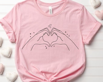 Valentine Heart Hands T-Shirt, Lover Gift Tee, Hand Heart Graphic Tshirt, Cute Heart Gesture Shirt, Fan Gift Tee, Matching Heart Design Tee