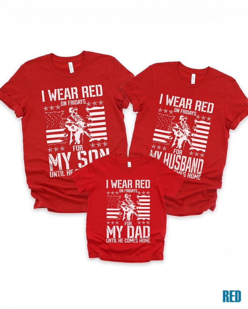 May include: Three red t-shirts with white graphic prints. Each shirt features a soldier silhouette, an American flag, and text reading I WEAR RED ON FRIDAYS FOR MY SON, MY HUSBAND, OR MY DAD UNTIL HE COMES HOME. The shirts have short sleeves and crew necks.