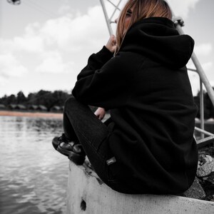 Unisex Oversized Black Hoodie with kangaroo pocket. image 7